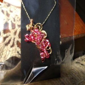 Grape cluster necklace.